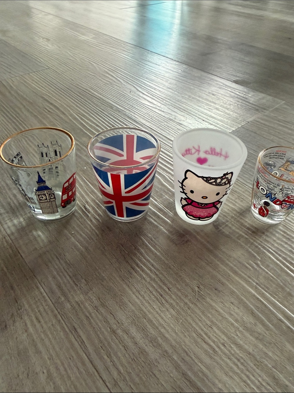 Set of four london shot glasses